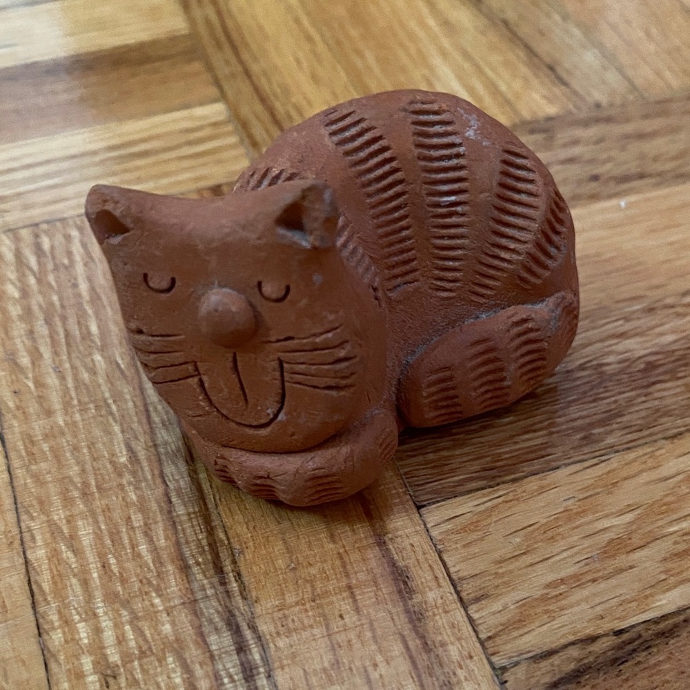 Cute little terra cotta clay small cat kitty figurine